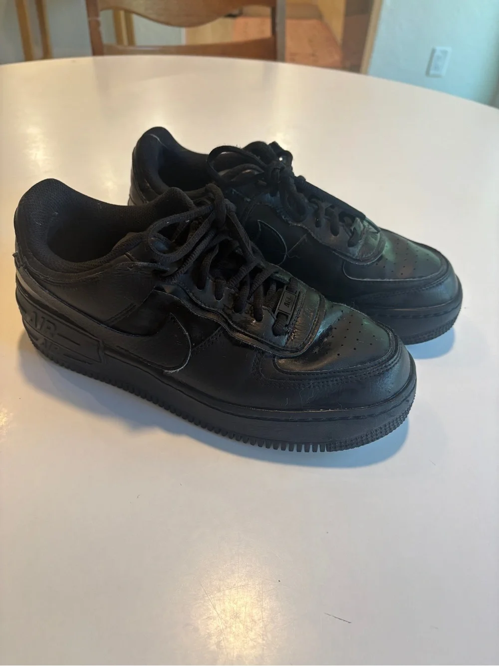 Nike Men’s Air Force 1 Low All-Black Leather Sneakers